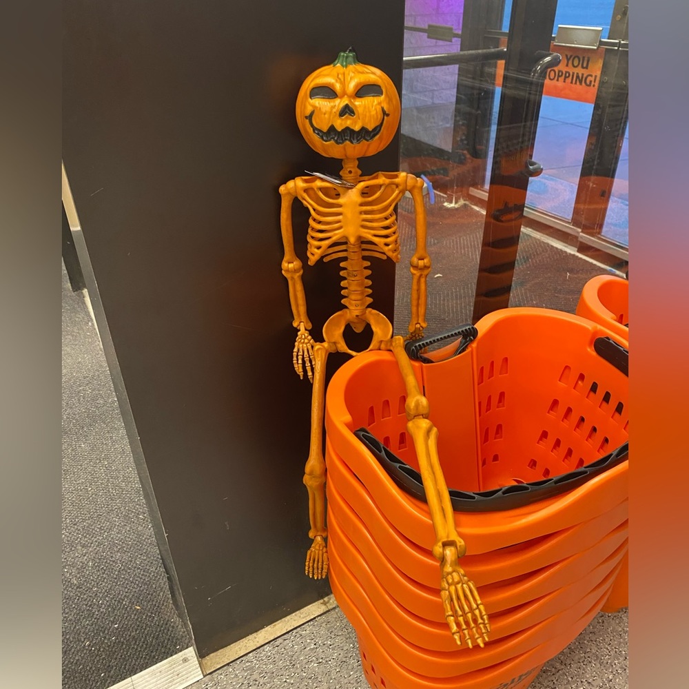 Orange pumpkin skeleton for Halloween decor